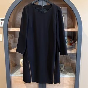 Elegant Black Dress with Gold Accents